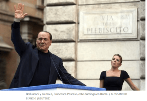 Berlusconi y su escort, perdón, novia, jejeje
